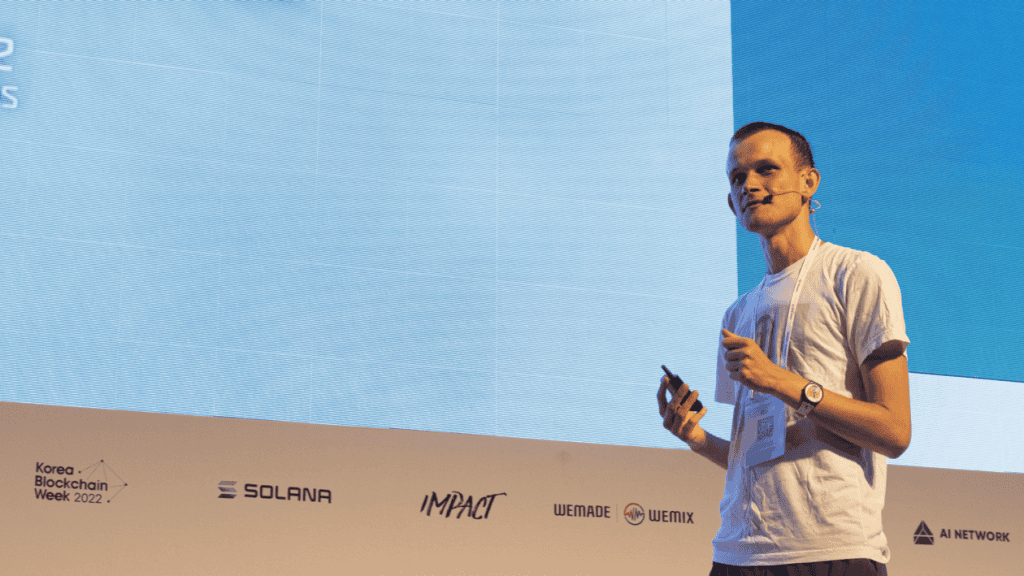 Vitalik Buterin speaking at a blockchain conference